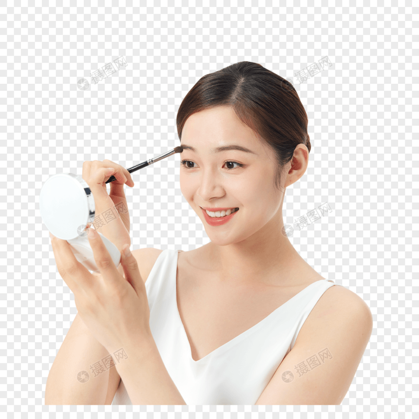 年轻美女使用眉笔化妆图片