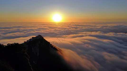 山顶的日出云层之上山峰高清图片