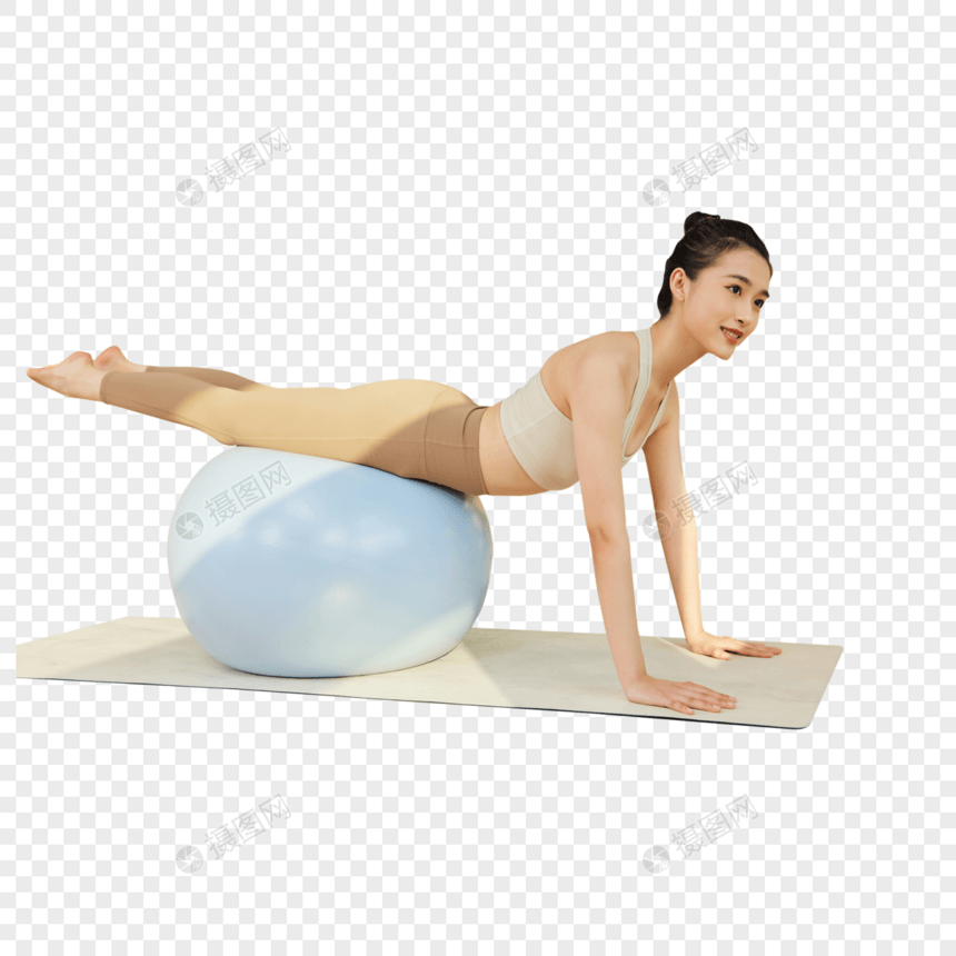 年轻女生使用瑜伽球运动图片