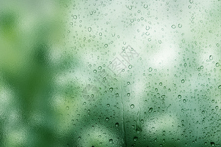 下雨花唯美绿色雨滴背景设计图片