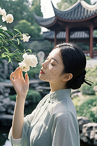 夏天闻着花香的文艺胶片女性人像摄影青春高清图片素材