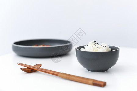 米饭与碗黑芝麻米饭蒸米饭背景