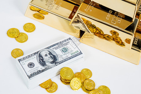 汉装金砖钱散乱摆放的金币和钞票背景
