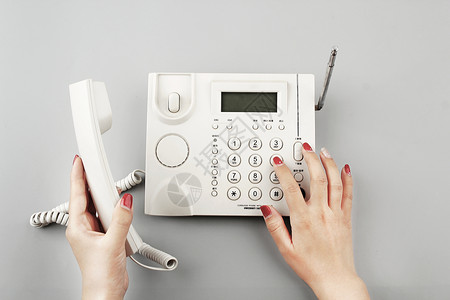 白色电话素材白色的电话座机背景