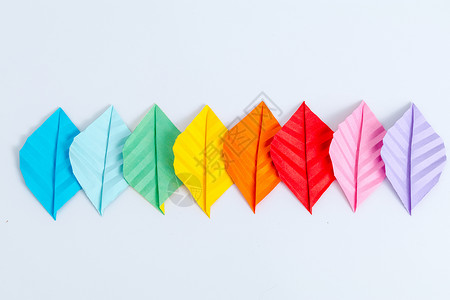 折纸艺术字手工创意彩色树叶渐变平拍背景