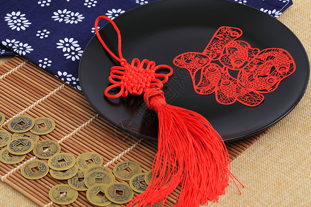 红色鱼形剪纸传统工艺品中国结剪纸背景