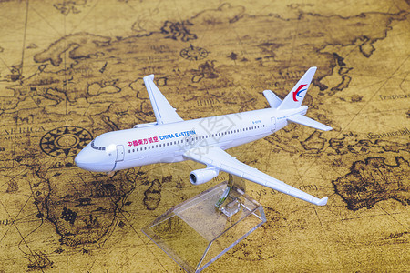 地图上折线图世界地图上的飞机模型背景