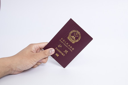 港澳通行证手拿护照证件背景
