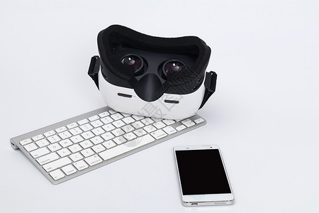 白色VR眼镜键盘手机图片