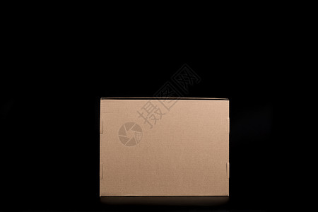 黑色纸盒物流快递纸质盒子横放背景