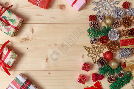 黄色礼盒盒子圣诞节装饰品木板装扮背景背景