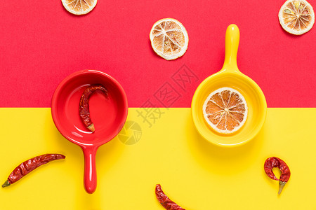 柠檬片红辣椒撞色背景素材高清图片