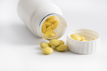 黄色药片疼痛药罐子高清图片