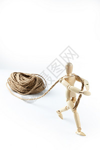 一捆棕色的细麻绳背景图片