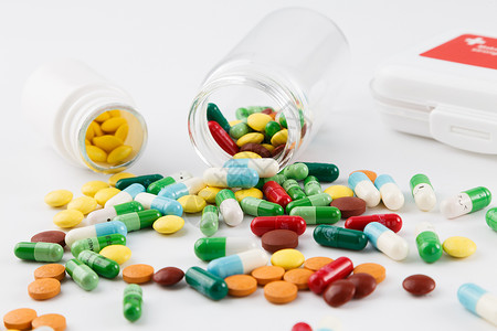 药物流产各种颜色彩色的药片和胶囊背景
