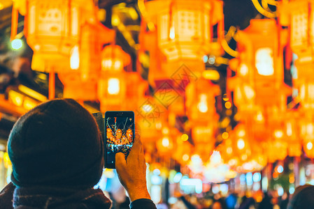 夜景人群过年元宵节灯会背景