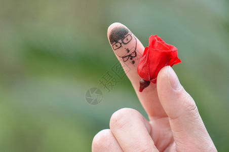 玫瑰标志创意拇指上的头像背景