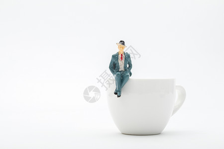 卡通人物设计坐在咖啡杯上的商务人士背景