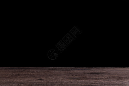 木制桌面和黑背景背景图片