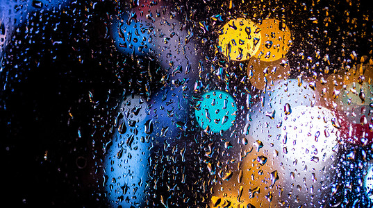 闪亮光圈雨天背景