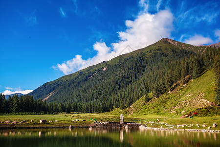 ppt水素材国外美景 高山湖面草原 风车背景