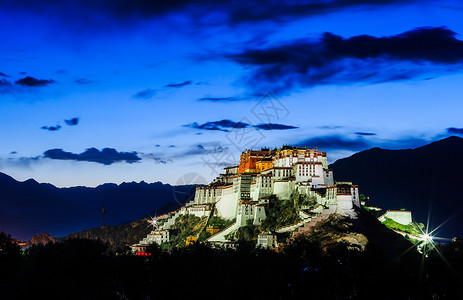 旅游业广告素材夜色中的布达拉宫夜景背景