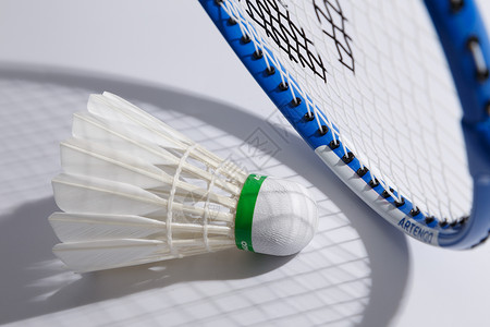 比赛项目羽毛球与拍子背景