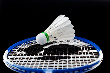设计竞赛羽毛球与拍子背景
