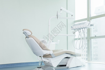 牙科卫生医疗器材牙医躺椅背景