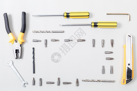 工具刀整齐排列的各种修理工具背景