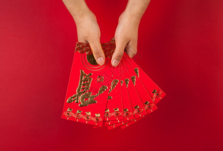 中国特色习俗手拿红包送礼祝贺背景