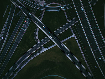高速夜景立交桥与城市道路航拍背景