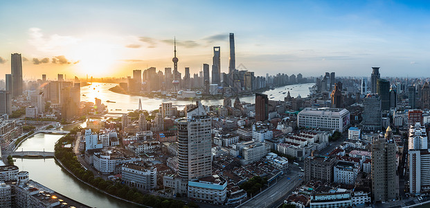 金融建设上海黄浦江外滩陆家嘴日出全景图背景