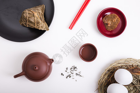 端午节食用粽子喝茶背景背景图片