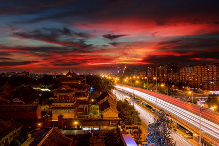 北京火烧云下的雍和宫桥夜景背景图片