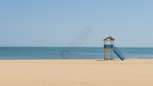 炎热沙滩沙滩瞭望塔背景