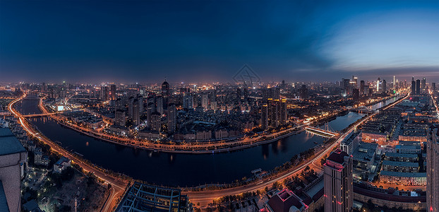 桥夜晚蜿蜒海河背景