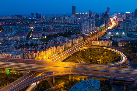 蓝色路灯城市立交桥夜景背景