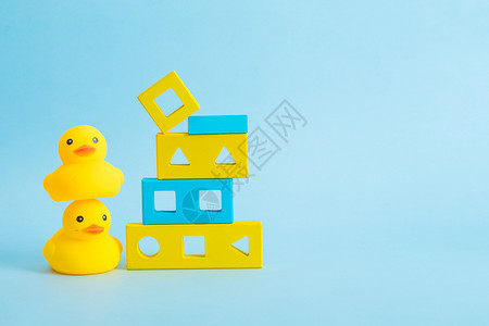 益智玩具促销儿童节小黄鸭积木背景
