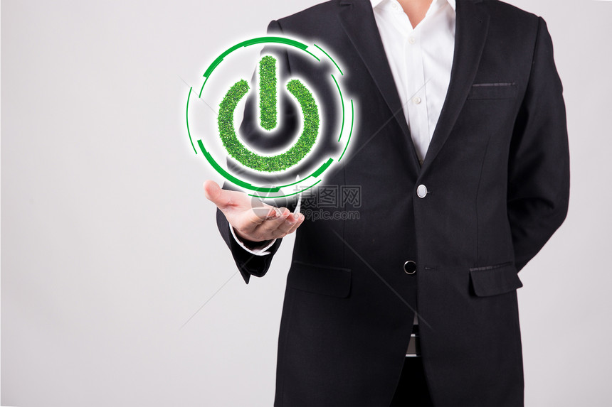 手中的绿色开关标志科技商务图片