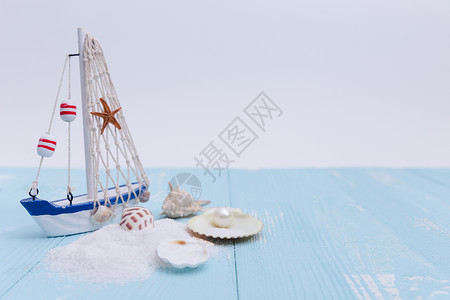 帆船励志素材夏日沙滩珍珠海星帆船素材背景