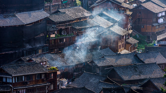 城市与农村村舍炊烟背景