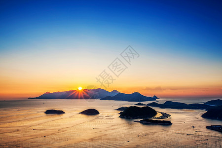 海上日出风景滩涂高清图片