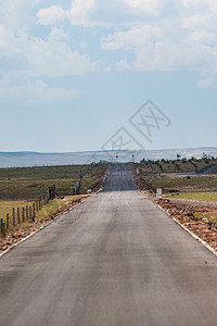 双车道一条笔直的公路背景