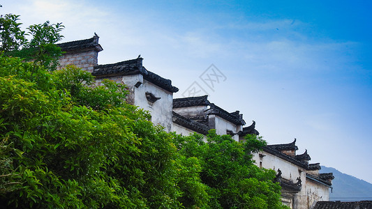 中式徽派建筑蓝天下的古建筑徽派建筑背景