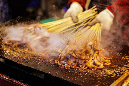 美食啤酒夜市鱿鱼烧烤背景