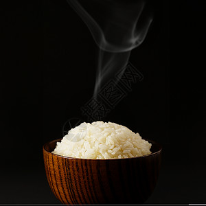 黑色简洁饱满诱人的米饭背景