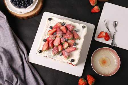 卡通蓝莓蛋糕美味的草莓蛋糕背景