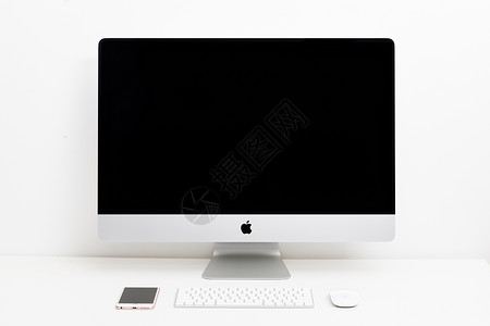 办公电脑鼠标摆放整齐简洁的苹果电脑一体机背景