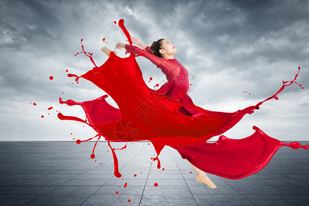 海边长裙穿着红色油漆长裙跳舞的女性设计图片